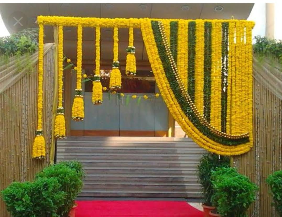 Grand marigold staircase entrance decoration by Akash Flower Decoration